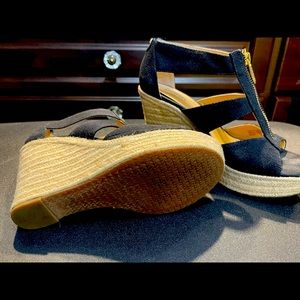 Slightly worn Michael kits wedge sandals.